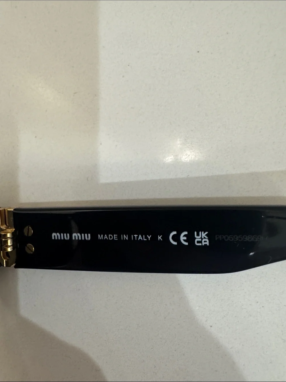 Miu Miu Black sunglasses  Miu Miu MU A03S